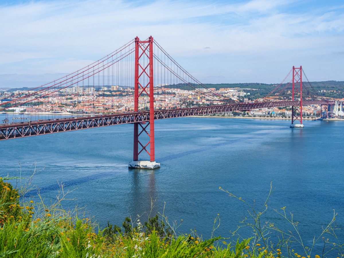 The red Ponte 25 de Abril suspension bridge over the Tagus